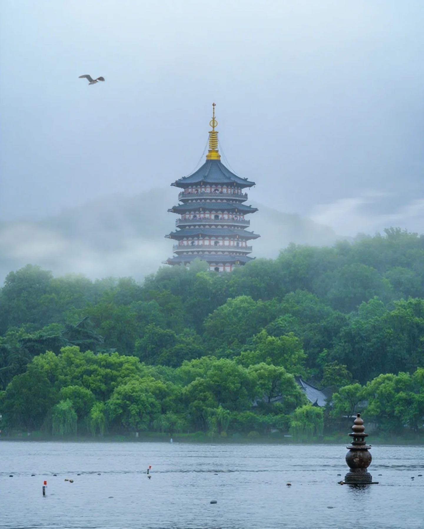 Misty West Lake with soft water and trees